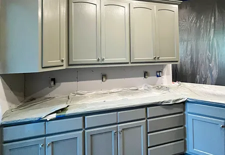 Kitchen cabinet painting in San Antonio with smooth white finish